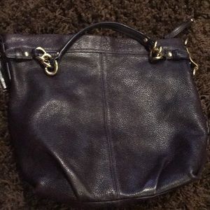 Coach purple leather purse.